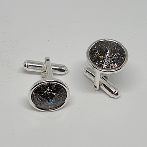 Round silver cufflinks with Swarovski crystals.