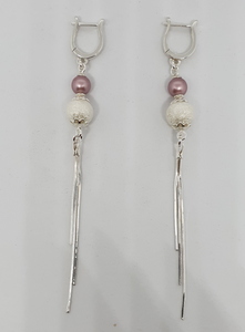 Orecchini di Perle di cotone Swarovski.