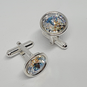 Round silver cufflinks with Swarovski crystals.