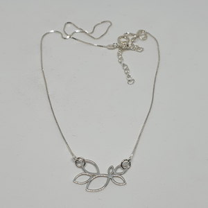 Silver necklace with openwork leaf pendant