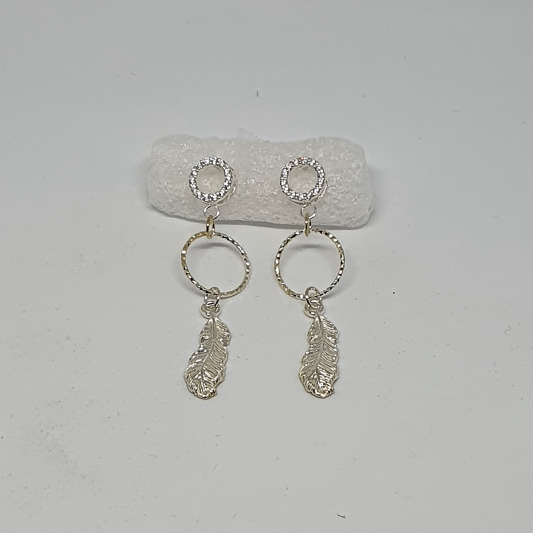 Silver earrings with feathers